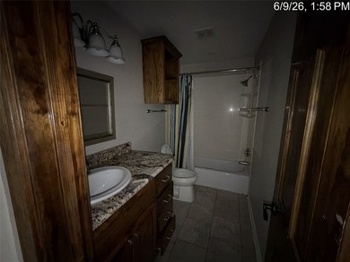 Set on 1.48 wooded acres along Lake Limestone, this custom stone - photo 28
