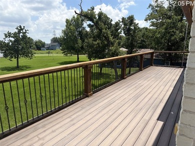 Set on 1.48 wooded acres along Lake Limestone, this custom stone - photo 33