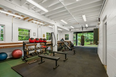 Stunning farmhouse estate nestled on 5 acres of secluded, gated - photo 19