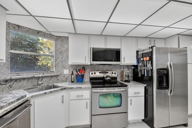 Step into resort style living in this upgraded 3 bedroom, 2 bath - photo 31