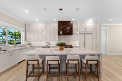 Newly completed in 2025, this exceptional oceanfront estate is