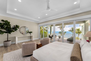 Newly completed in 2025, this exceptional oceanfront estate is