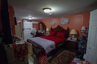 This well-maintained legal two-family, 6 bedroom, 3 bath brick - photo 22