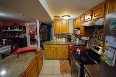 This well-maintained legal two-family, 6 bedroom, 3 bath brick - photo 25