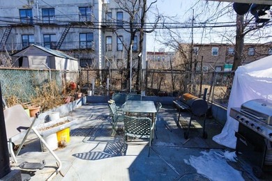 This well-maintained legal two-family, 6 bedroom, 3 bath brick - photo 30