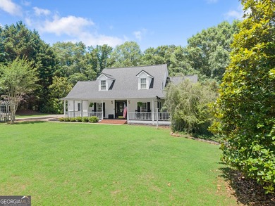 Nestled on 3.31 acres in the highly sought-after North Hall - photo 3