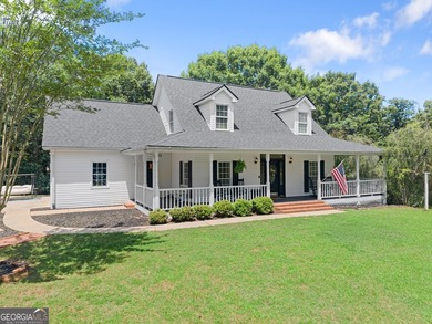 Nestled on 3.31 acres in the highly sought-after North Hall - photo 4