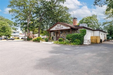 Nestled in the heart of Bellmore, New York, welcome to Oak - photo 3