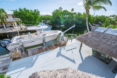Nestled on the picturesque shores of Ramrod Key, this stunning - photo 16