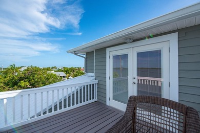 Nestled on the picturesque shores of Ramrod Key, this stunning - photo 36