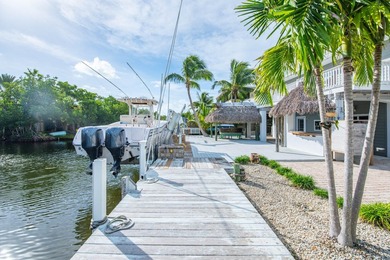 Nestled on the picturesque shores of Ramrod Key, this stunning - photo 43