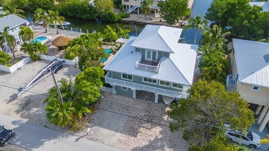 Nestled on the picturesque shores of Ramrod Key, this stunning - photo 46