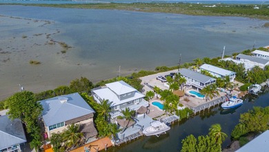 Nestled on the picturesque shores of Ramrod Key, this stunning - photo 47