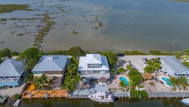 Nestled on the picturesque shores of Ramrod Key, this stunning - photo 48