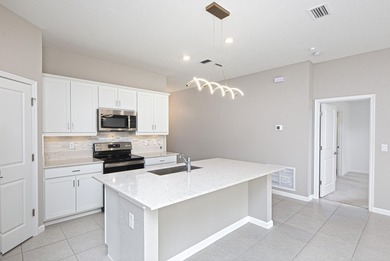 Welcome home to this beautifully constructed home located in the - photo 11