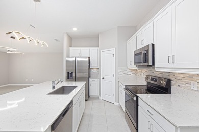 Welcome home to this beautifully constructed home located in the - photo 12