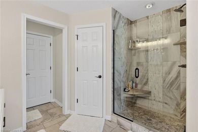 Perched on a premier .90-acre lot in the prestigious Point at - photo 29