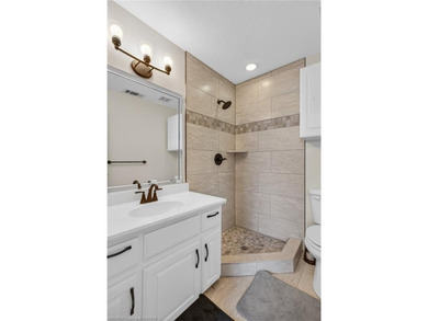 Perched on a premier .90-acre lot in the prestigious Point at - photo 37