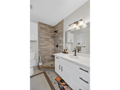 Perched on a premier .90-acre lot in the prestigious Point at - photo 47