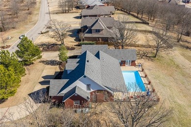 Perched on a premier .90-acre lot in the prestigious Point at - photo 49
