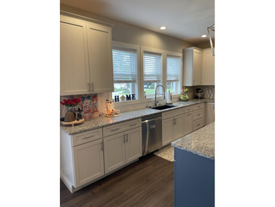 PRICE IMPROVEMENT! A sudden job transfer makes this stunning - photo 12