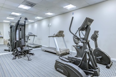 Welcome to Unit 701 at The Ashworth, a rare 4-bedroom