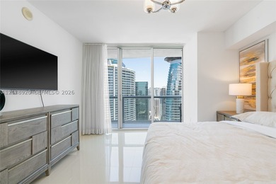 Experience luxury living at Icon Brickell Tower I. This bright - photo 12