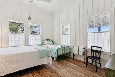 Tucked beneath a canopy of majestic live oaks along the serene - photo 28