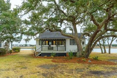 Tucked beneath a canopy of majestic live oaks along the serene - photo 41