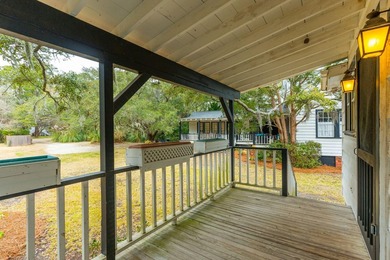 Tucked beneath a canopy of majestic live oaks along the serene - photo 42
