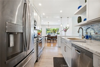 Fully turnkey and thoughtfully reimagined, this 4-bedroom - photo 3