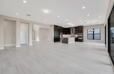 Lakefront luxury in this 5-bed single-family home in Avenir, new - photo 13