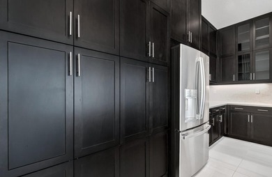 Lakefront luxury in this 5-bed single-family home in Avenir, new - photo 24