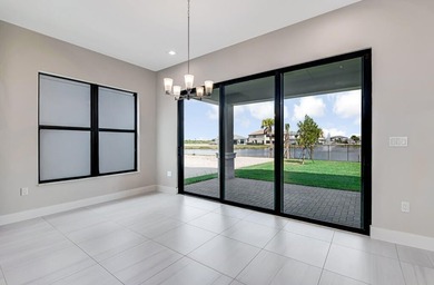 Lakefront luxury in this 5-bed single-family home in Avenir, new - photo 25