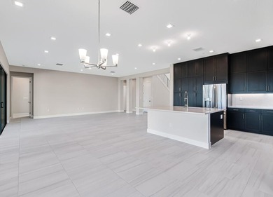 Lakefront luxury in this 5-bed single-family home in Avenir, new - photo 27