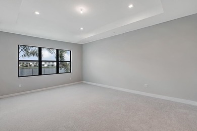 Lakefront luxury in this 5-bed single-family home in Avenir, new - photo 31