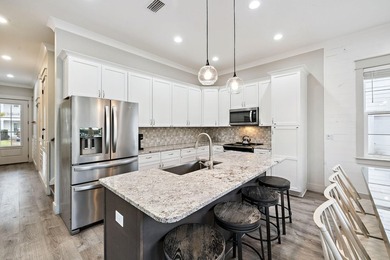 Created with entertaining in mind, this stunning three-story - photo 10