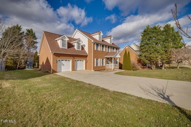 Welcome home to this inviting brick home tucked into the highly - photo 4