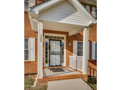 Welcome home to this inviting brick home tucked into the highly - photo 5