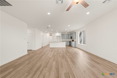 Upon entering this exceptional floor plan, you're immediately - photo 13