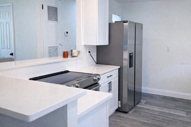 Virtually Staged. Discover this spacious 4-bedroom, 3-bath home - photo 2