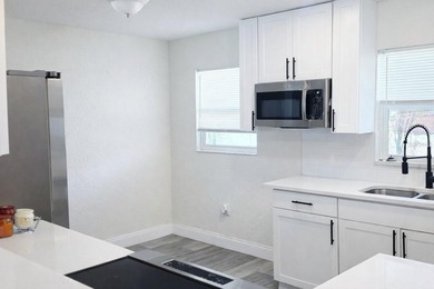Virtually Staged. Discover this spacious 4-bedroom, 3-bath home - photo 3