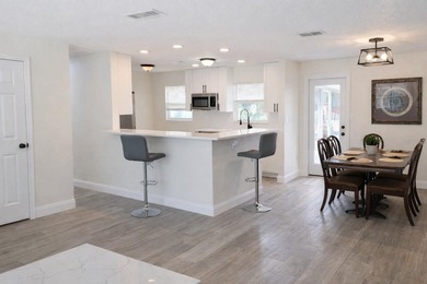Virtually Staged. Discover this spacious 4-bedroom, 3-bath home - photo 4