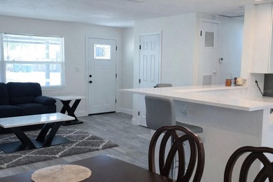 Virtually Staged. Discover this spacious 4-bedroom, 3-bath home - photo 5