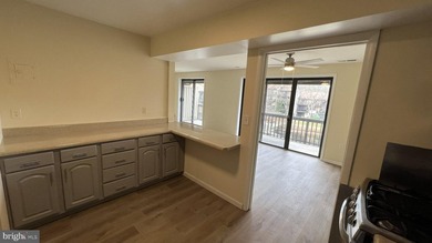 Welcome home to this beautifully refreshed top-level - photo 15