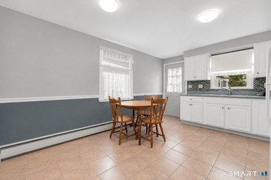 Excellent opportunity to own a well-maintained two-family home - photo 6