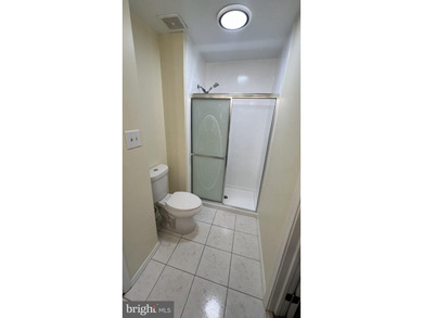Welcome home to this beautifully refreshed top-level - photo 17