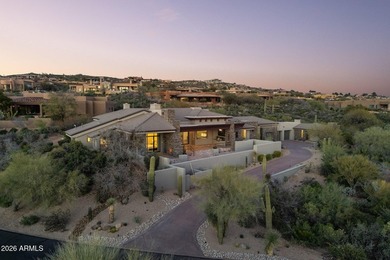 Framed by sweeping views of Pinnacle Peak and city lights, this