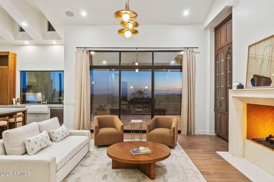 Framed by sweeping views of Pinnacle Peak and city lights, this