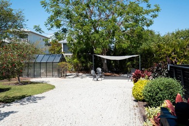 Beautifully remodeled 1998 concrete home is situated on a - photo 11